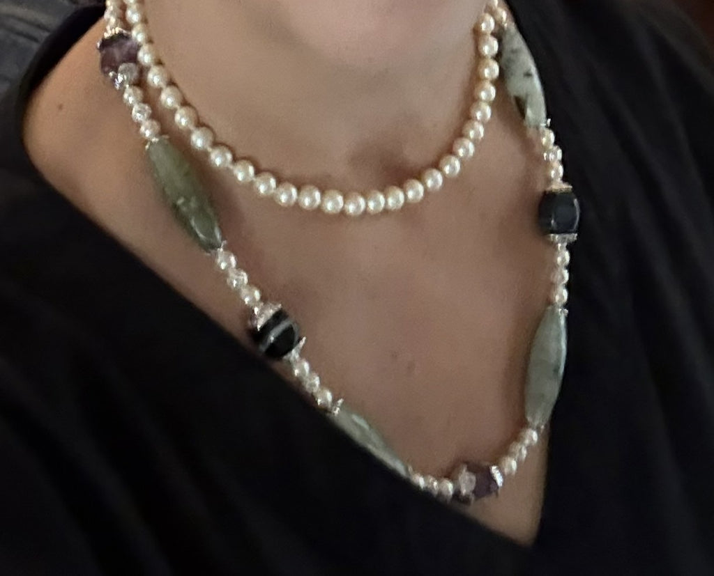 Styled with a pearl choker (sold separately) for a layered look